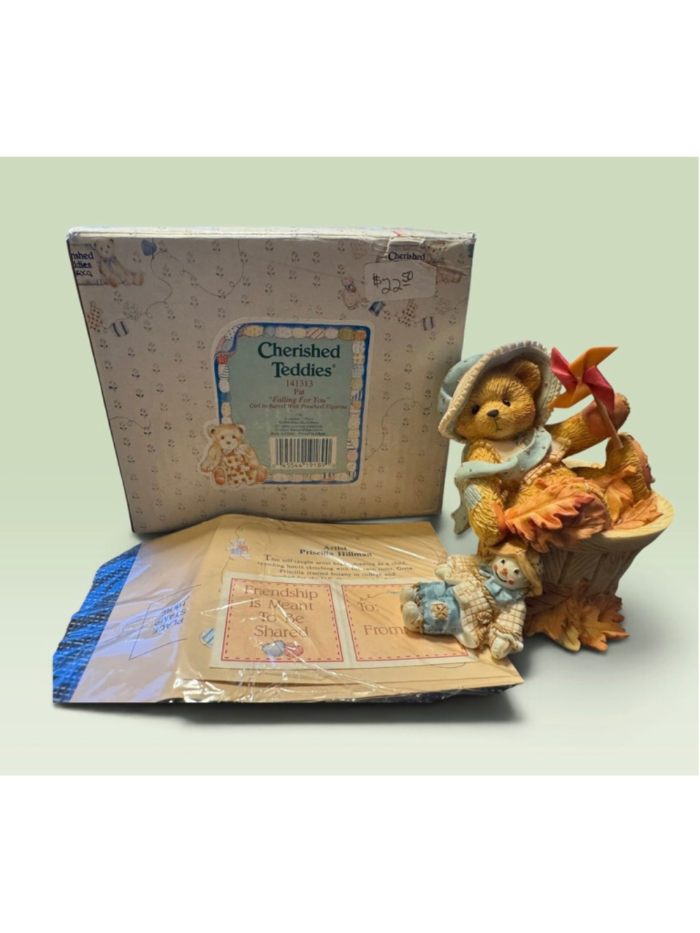 Cherished Teddies Pat Falling For You girl in barrel with pinwheel figurine